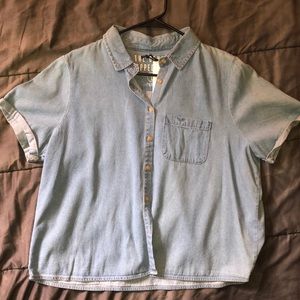 Cropped light wash denim shirt